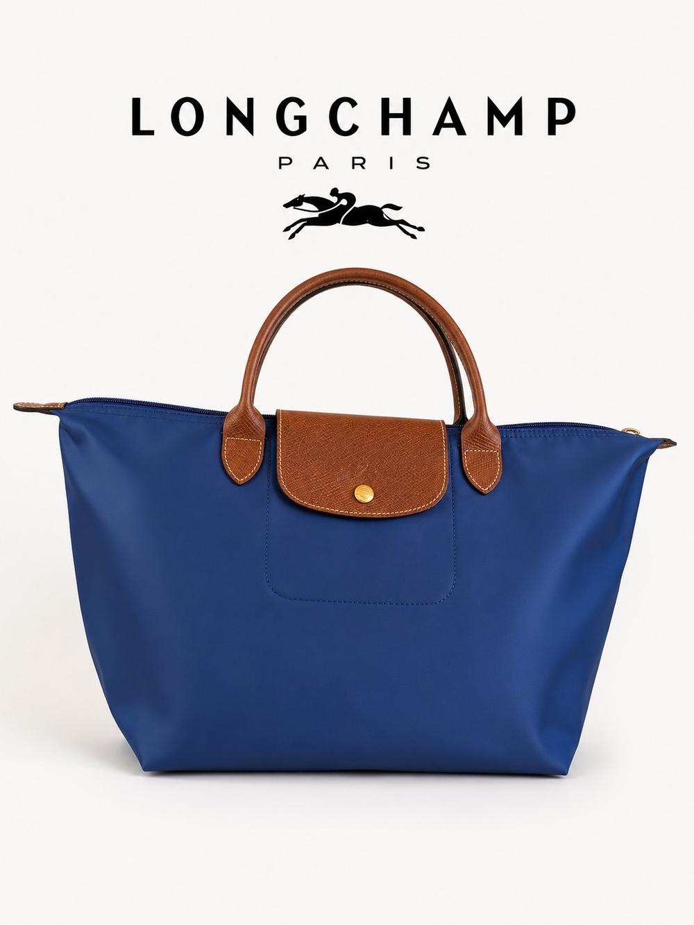 Longchamp nylon tote in royal blue with brown leather trim